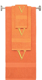 Orange monogrammed towel set with Gold thread, Times New Roman font, initial V - 540 GSM cotton 3-piece